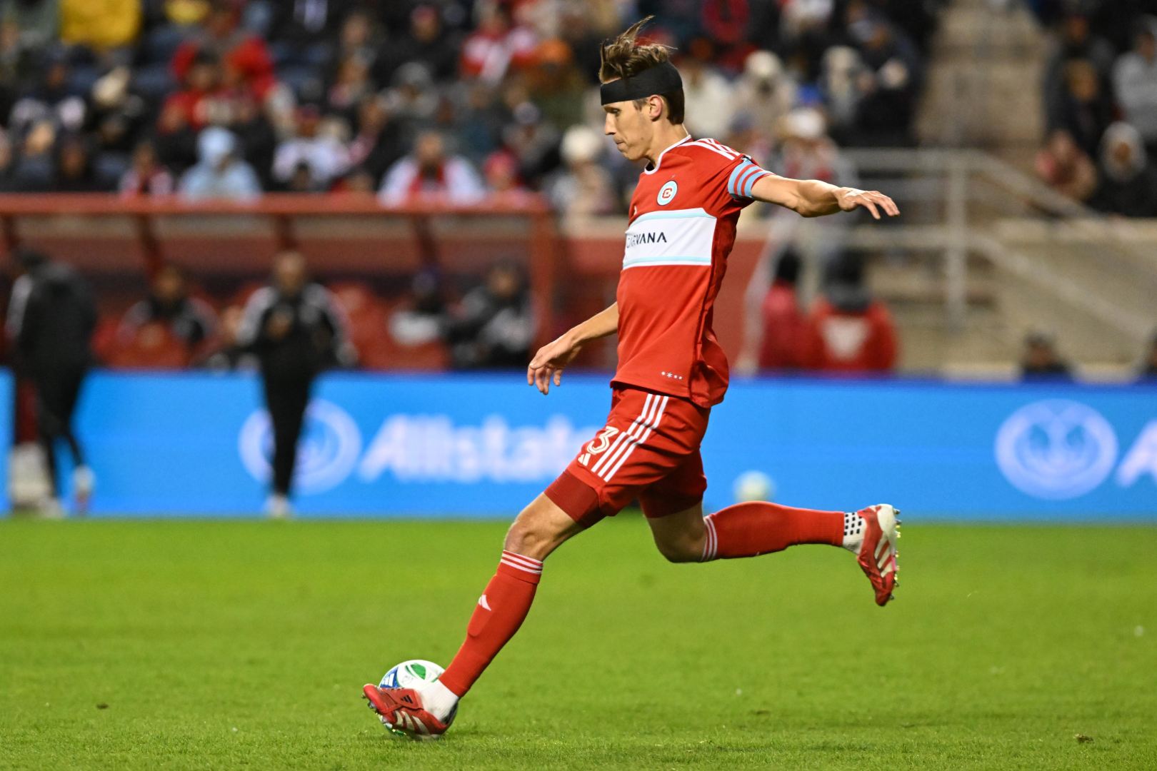 Jack Elliott with a black headband to cover a wound in the Chicago Fire's playoff game against Orlando City at SeatGeek Stadium on October 22, 2025