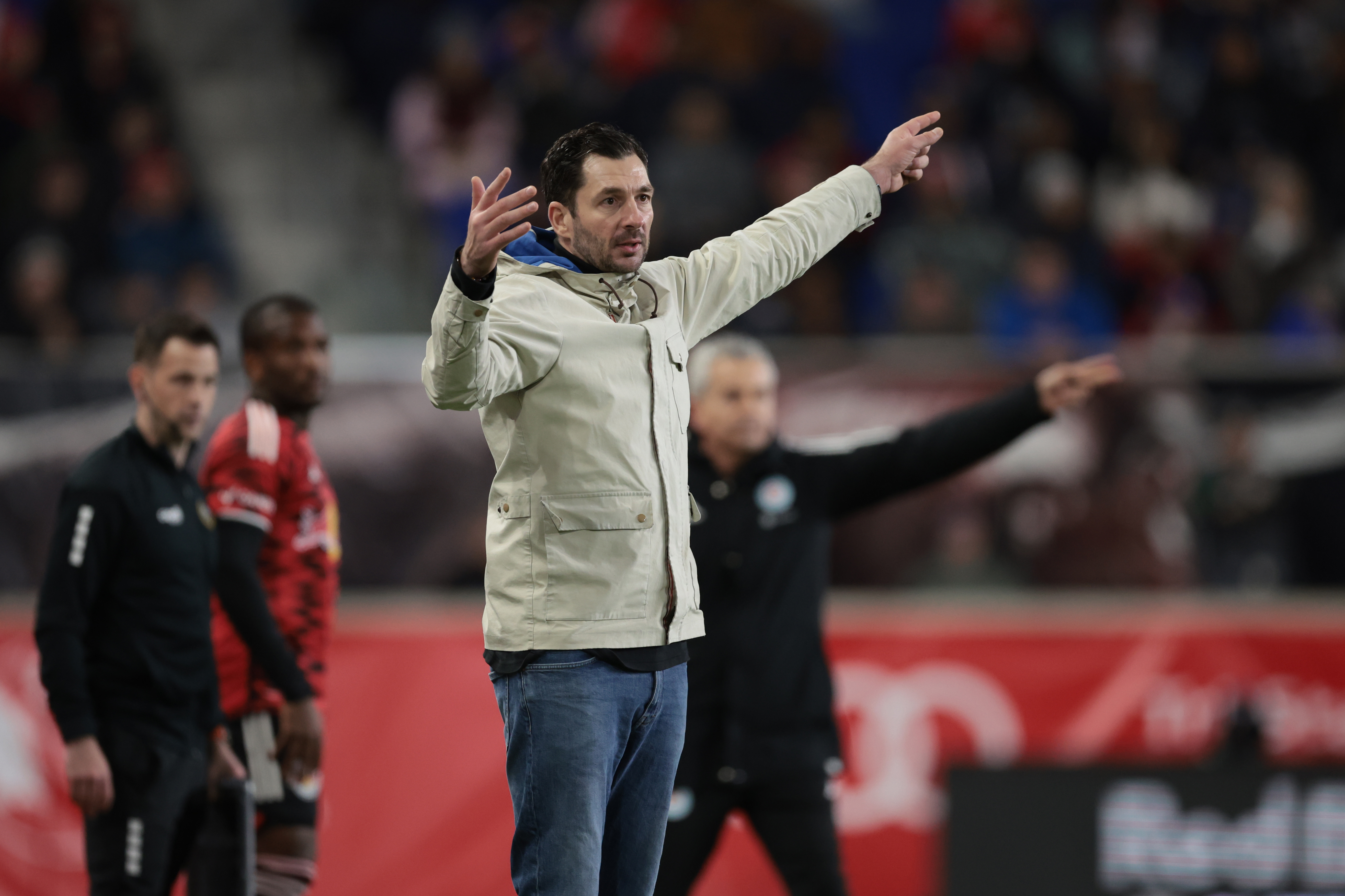 Apr 13, 2024; Harrison, New Jersey, USA; New York Red Bulls head coach Sandro Schwarz signals during the second half against Chicago Fire FC at Red Bull Arena. 