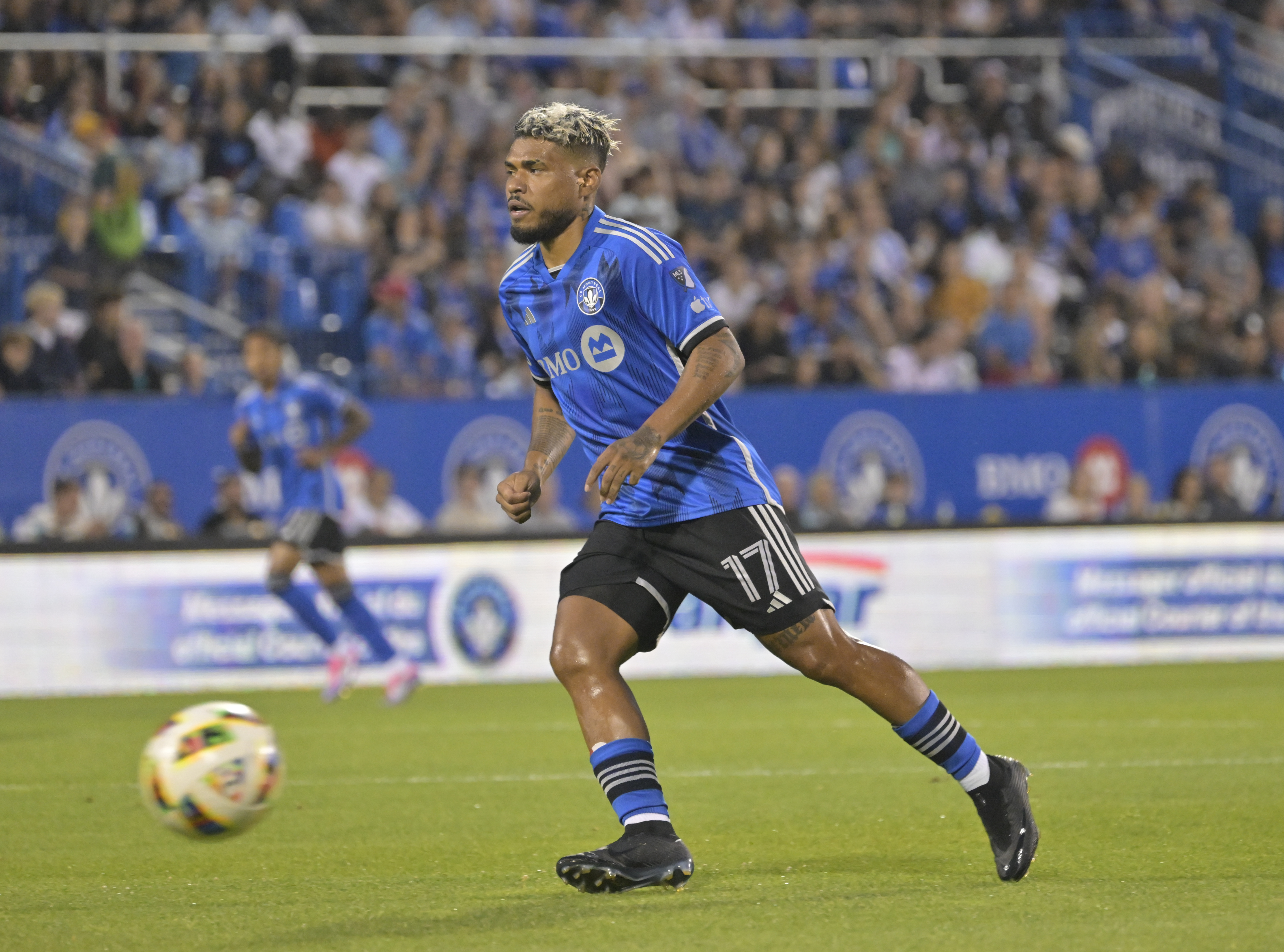 Aug 24, 2024; Montreal, Quebec, CAN; CF Montreal forward Josef Martinez (17) dribbles upfield during the first half at Stade Saputo.