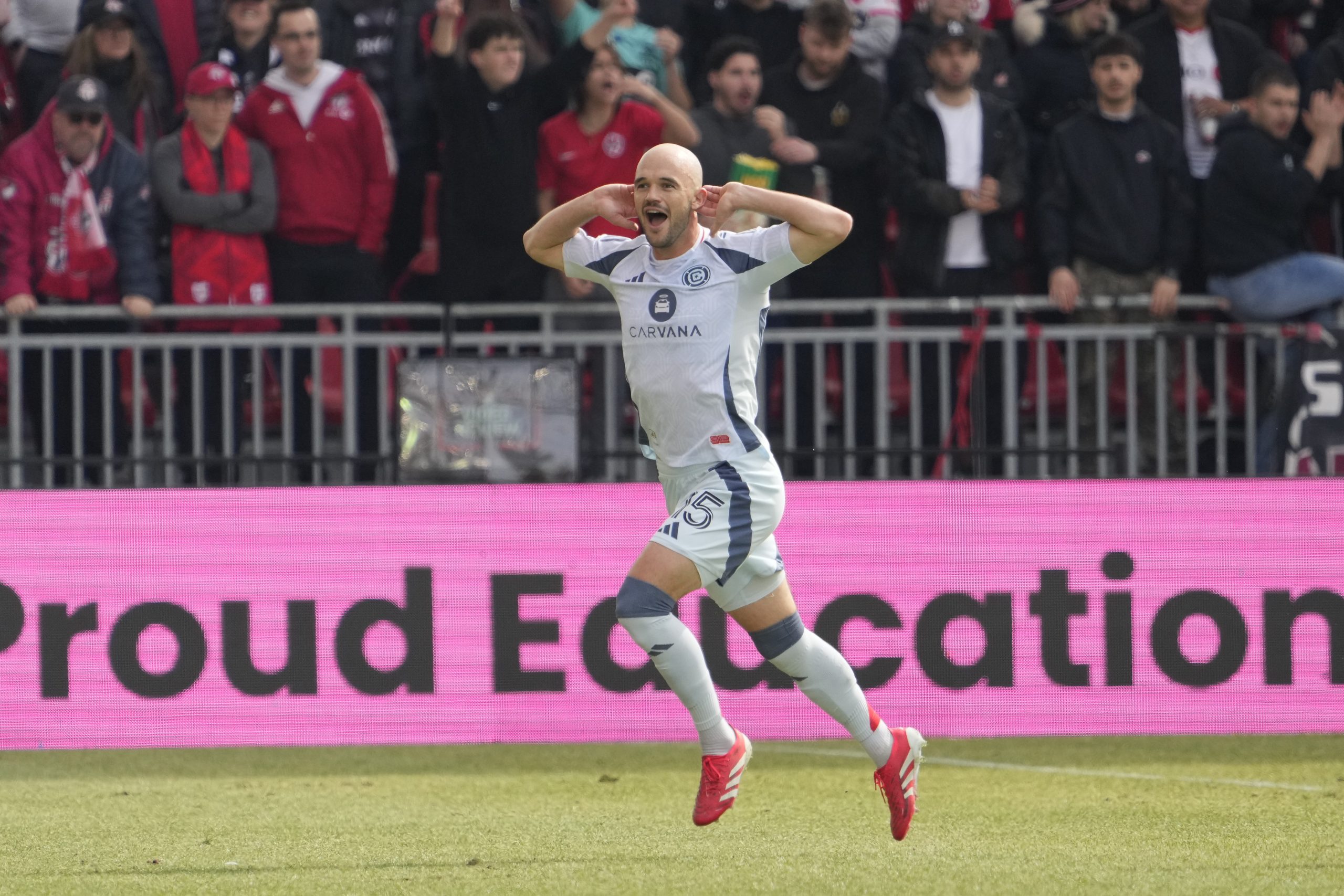 Mar 15, 2025; Toronto, Ontario, CAN; Chicago Fire defender Andrew Gutman (15) reacts after scoring against Toronto FC during the first half at BMO Field. Mandatory Credit: John E. Sokolowski-Imagn Images