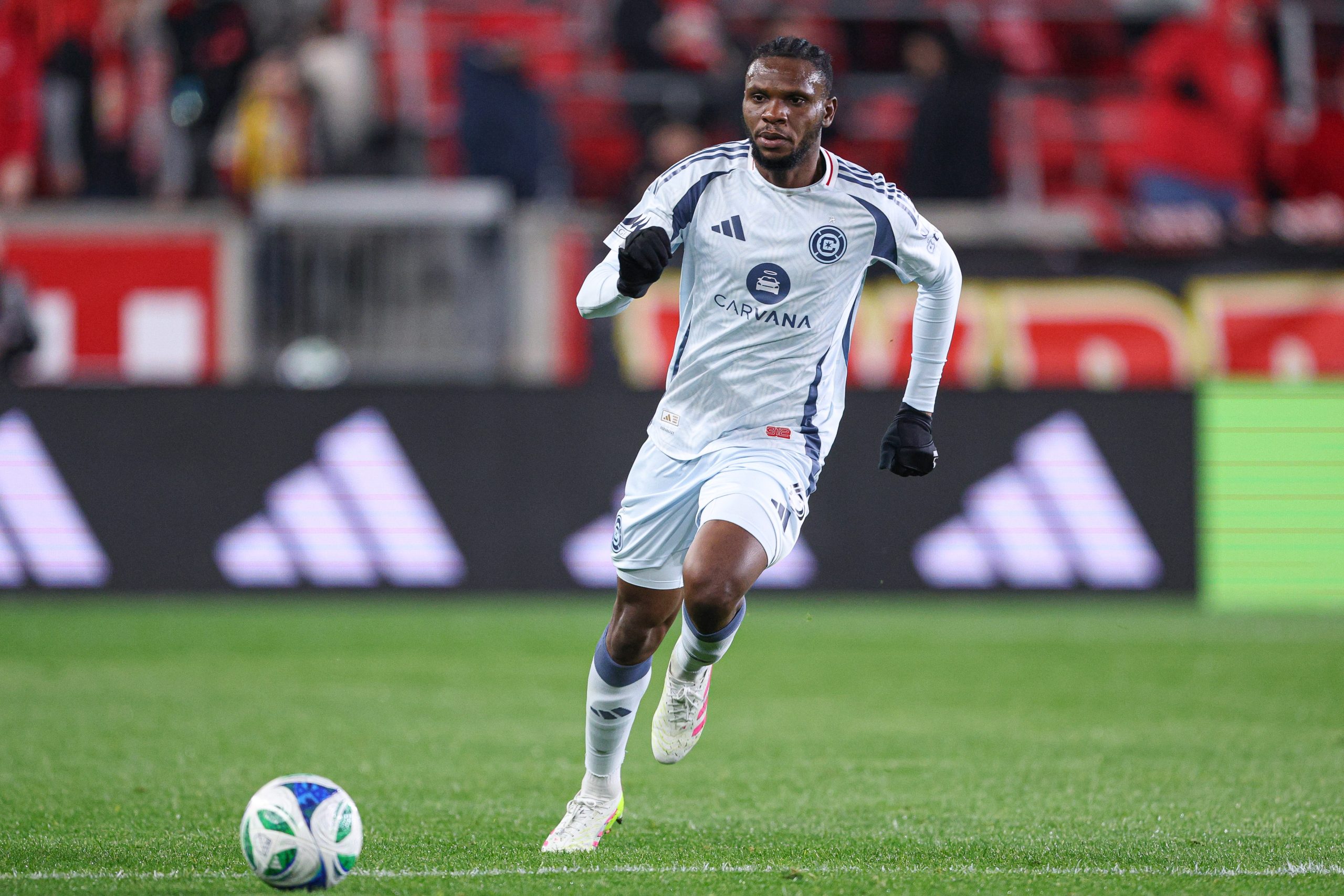 Apr 5, 2025; Harrison, New Jersey, USA; Chicago Fire FC midfielder Rominigue Kouame (6) plays the ball against the New York Red Bulls during the second half at Sports Illustrated Stadium. Mandatory Credit: Vincent Carchietta-Imagn Images