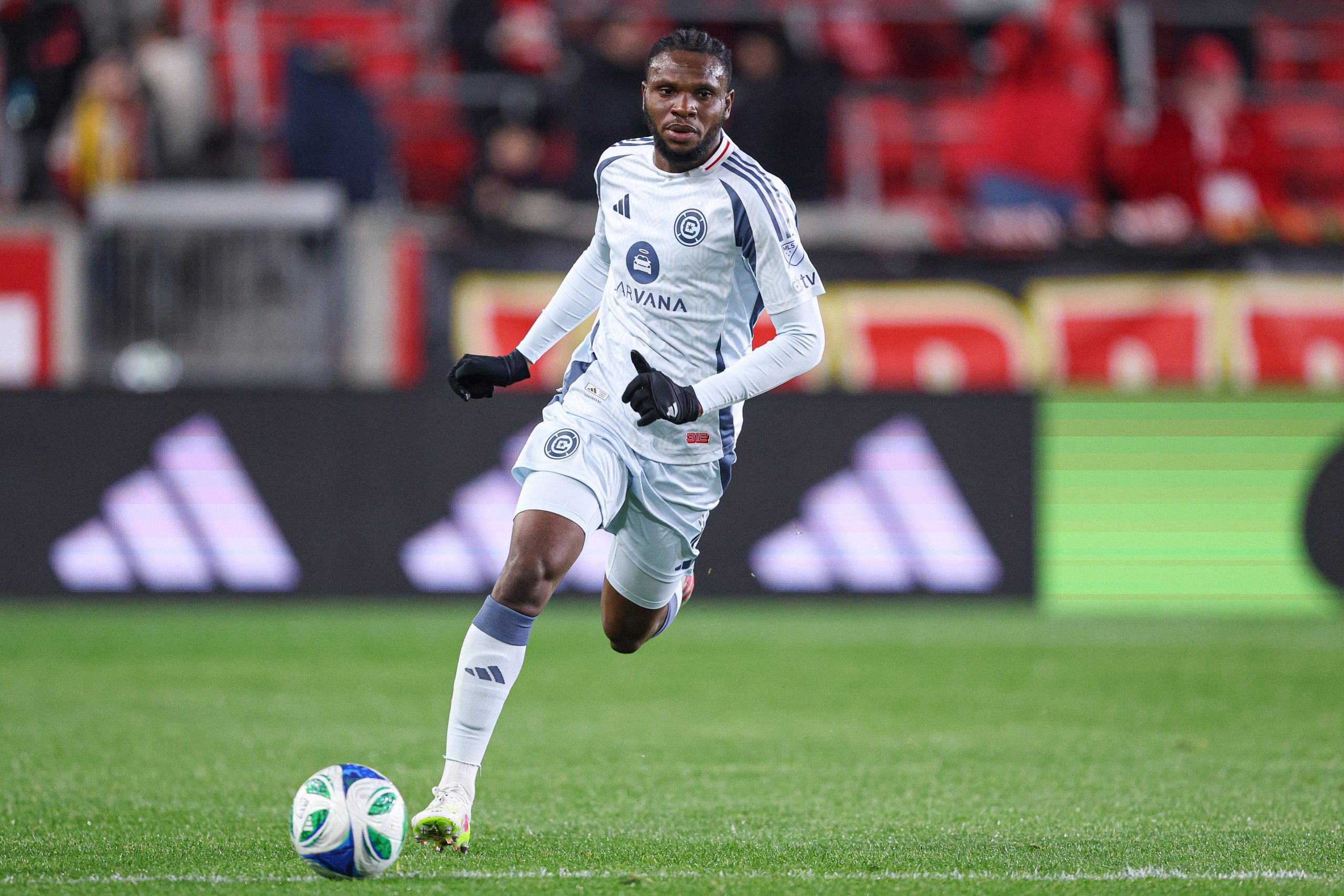 Apr 5, 2025; Harrison, New Jersey, USA; Chicago Fire FC midfielder Rominigue Kouame (6) plays the ball against the New York Red Bulls during the second half at Sports Illustrated Stadium. Mandatory Credit: Vincent Carchietta-Imagn Images