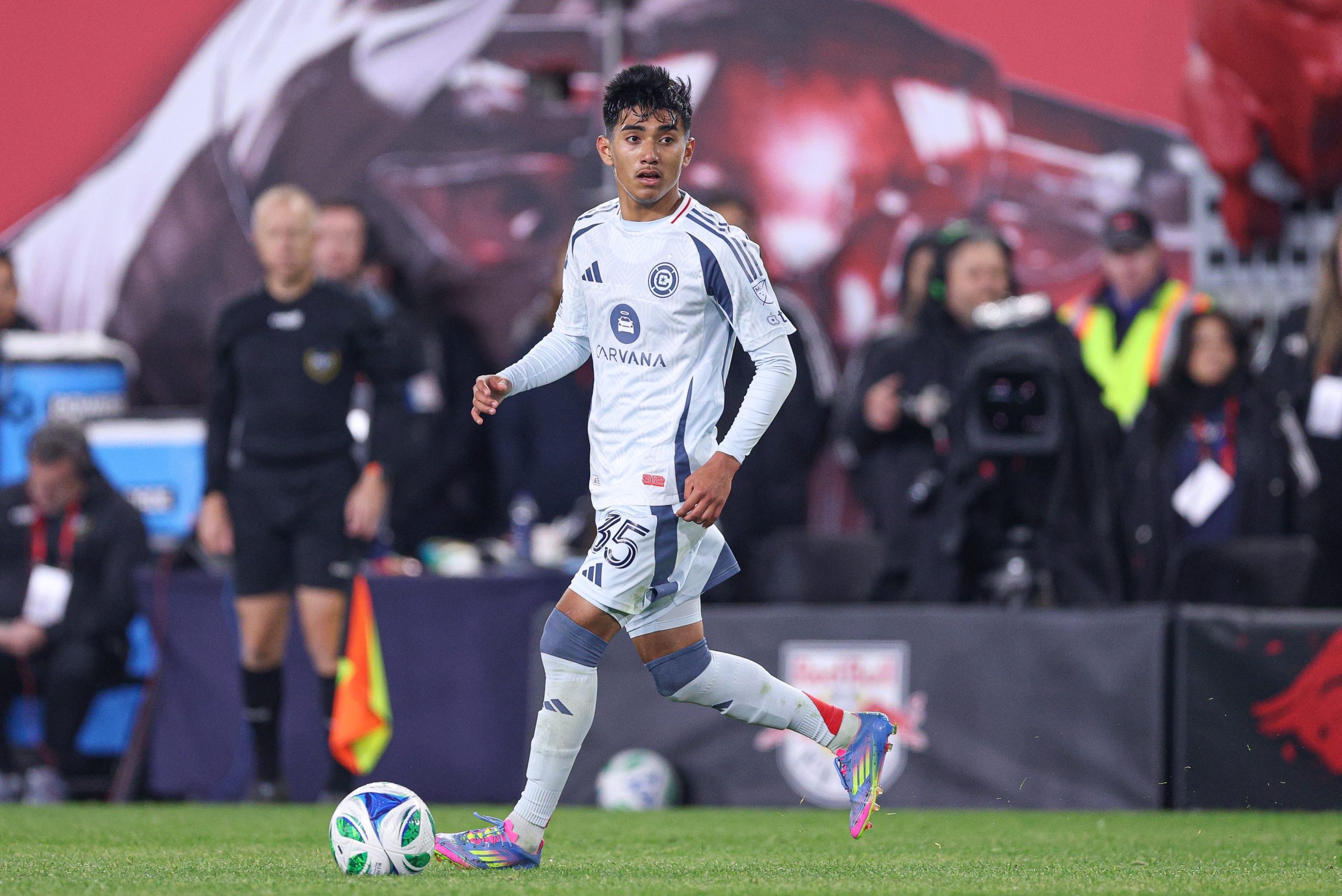 Apr 5, 2025; Harrison, New Jersey, USA; Chicago Fire FC midfielder Sergio Oregel (35) controls the ball against the New York Red Bulls during the second half at Sports Illustrated Stadium. Mandatory Credit: Vincent Carchietta-Imagn Images