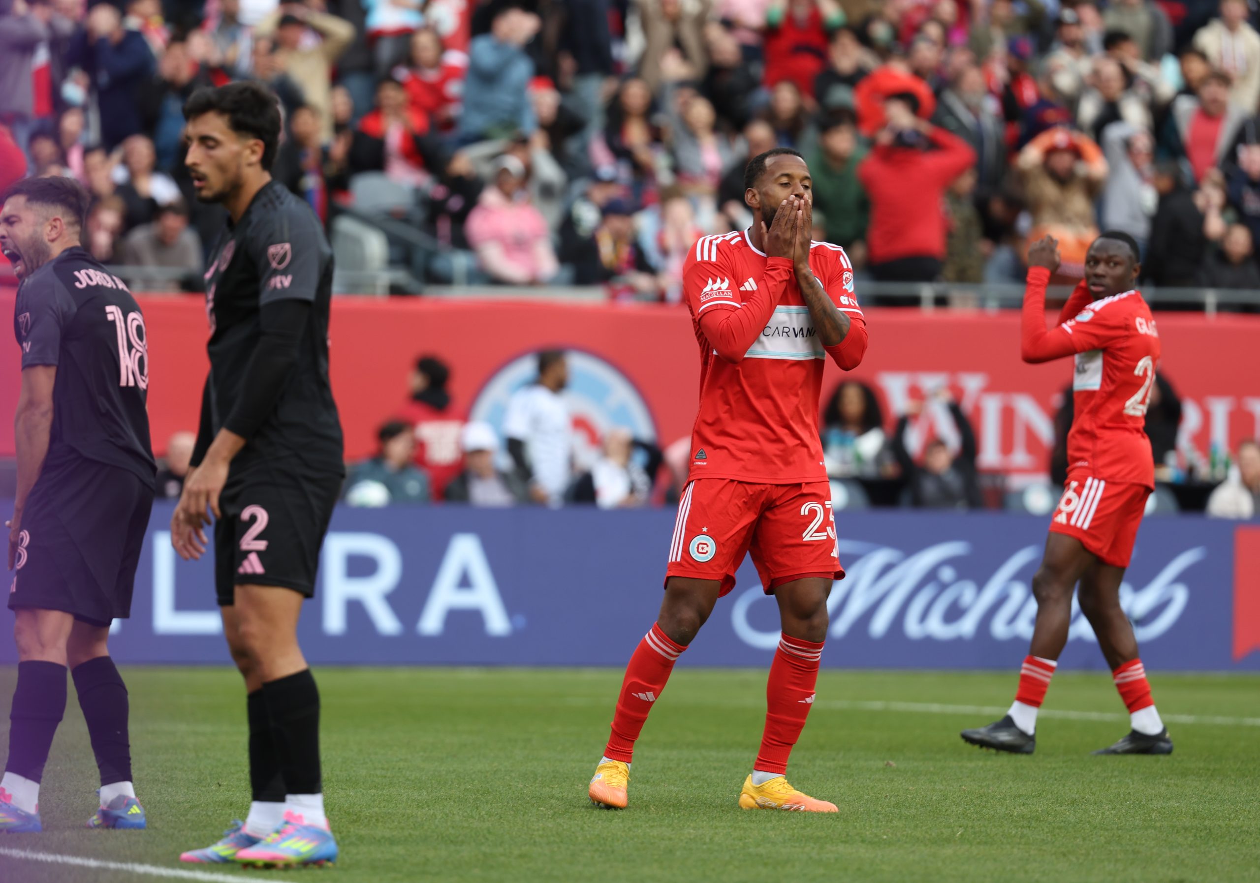 Apr 13, 2025; Chicago, Illinois, USA; Chicago Fire FC midfielder Kellyn Acosta (23) reacts after missing a shot on goal during the second half against Inter Miami CF at Soldier Field. Mandatory Credit: Talia Sprague-Imagn Images