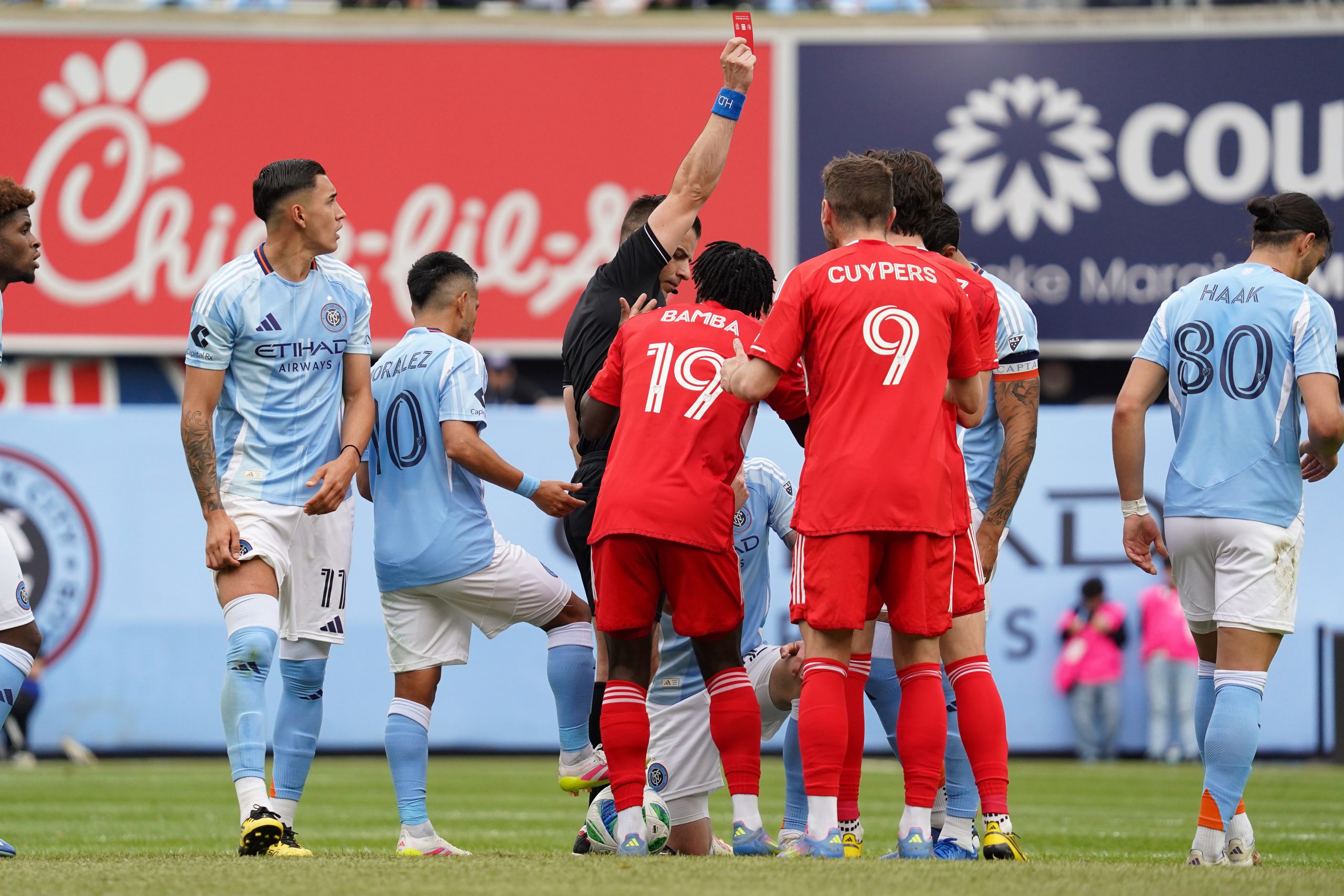 May 25, 2025; New York, New York, USA; Chicago Fire FC midfielder Brian Gutierrez (17) receives a red card during the first half against New York City FC at Yankee Stadium. Mandatory Credit: Lucas Boland-Imagn Images