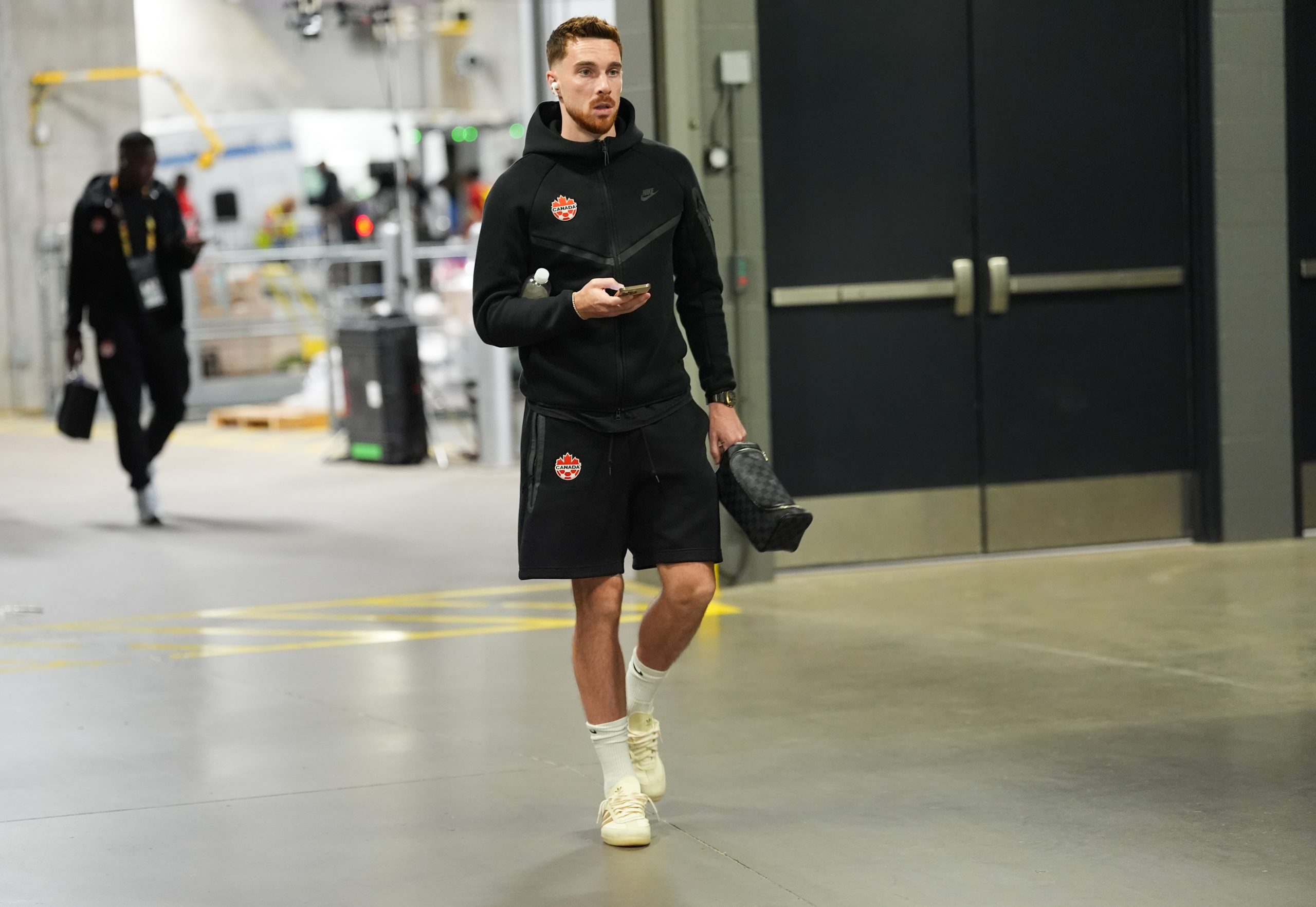 Jun 29, 2025; Minneapolis, Minnesota, USA; Canada defender Joel Waterman (5) arrives for the match against Guatemala before a quarterfinal match of the 2025 Gold Cup at U.S. Bank Stadium.