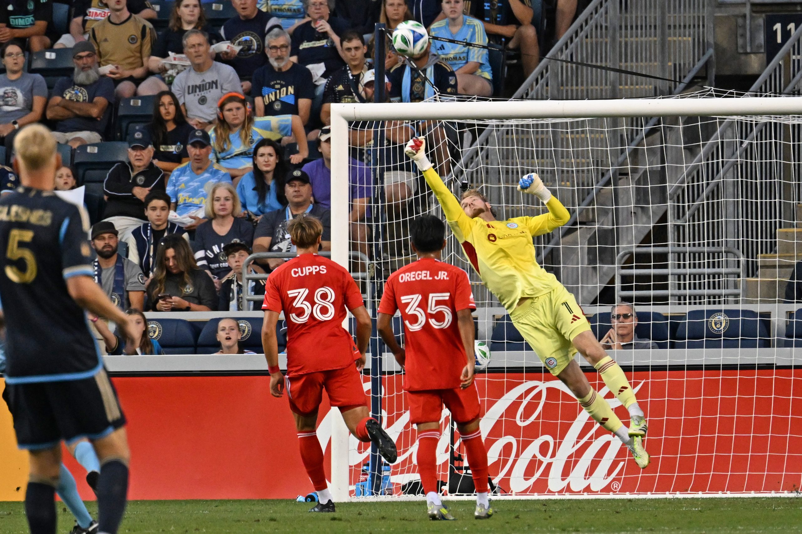 Aug 23, 2025; Chester, Pennsylvania, USA; Chicago Fire goalkeeper Chris Brady (1) makes a save against the Philadelphia Union during the first half at Subaru Park. Mandatory Credit: Eric Hartline-Imagn Images