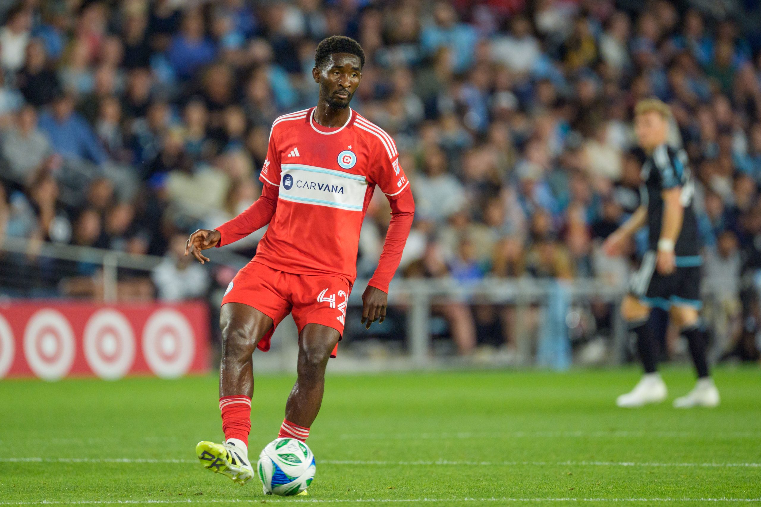 Sep 20, 2025; Saint Paul, Minnesota, USA; Chicago Fire midfielder Dje D’Avilla (42) dribbles near midfield against Minnesota United in the first half at Allianz Field. Mandatory Credit: Matt Blewett-Imagn Images