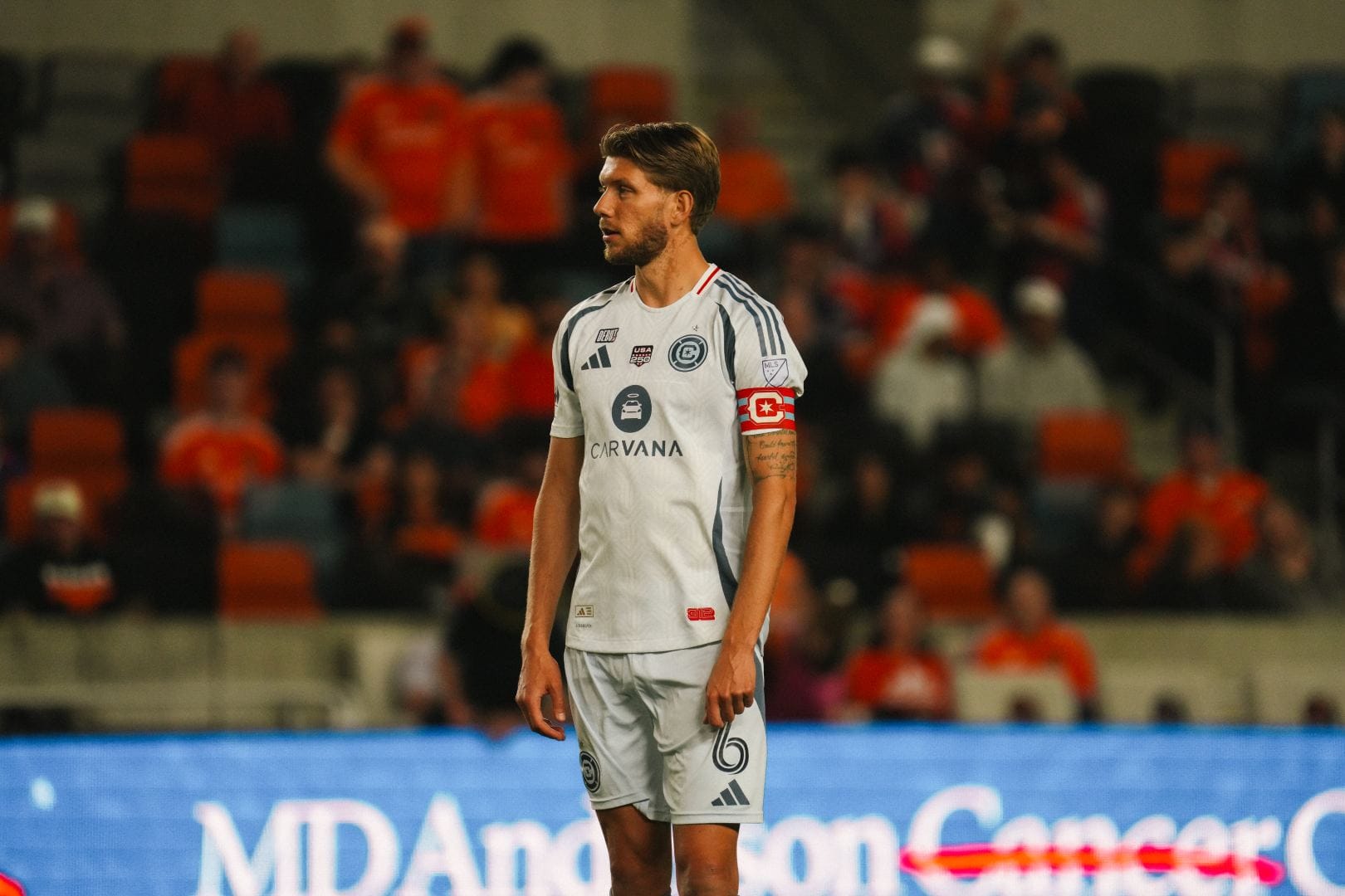 Anton Salétros standing at a soccer game at Shell Energy Stadium on February 21, 2022.