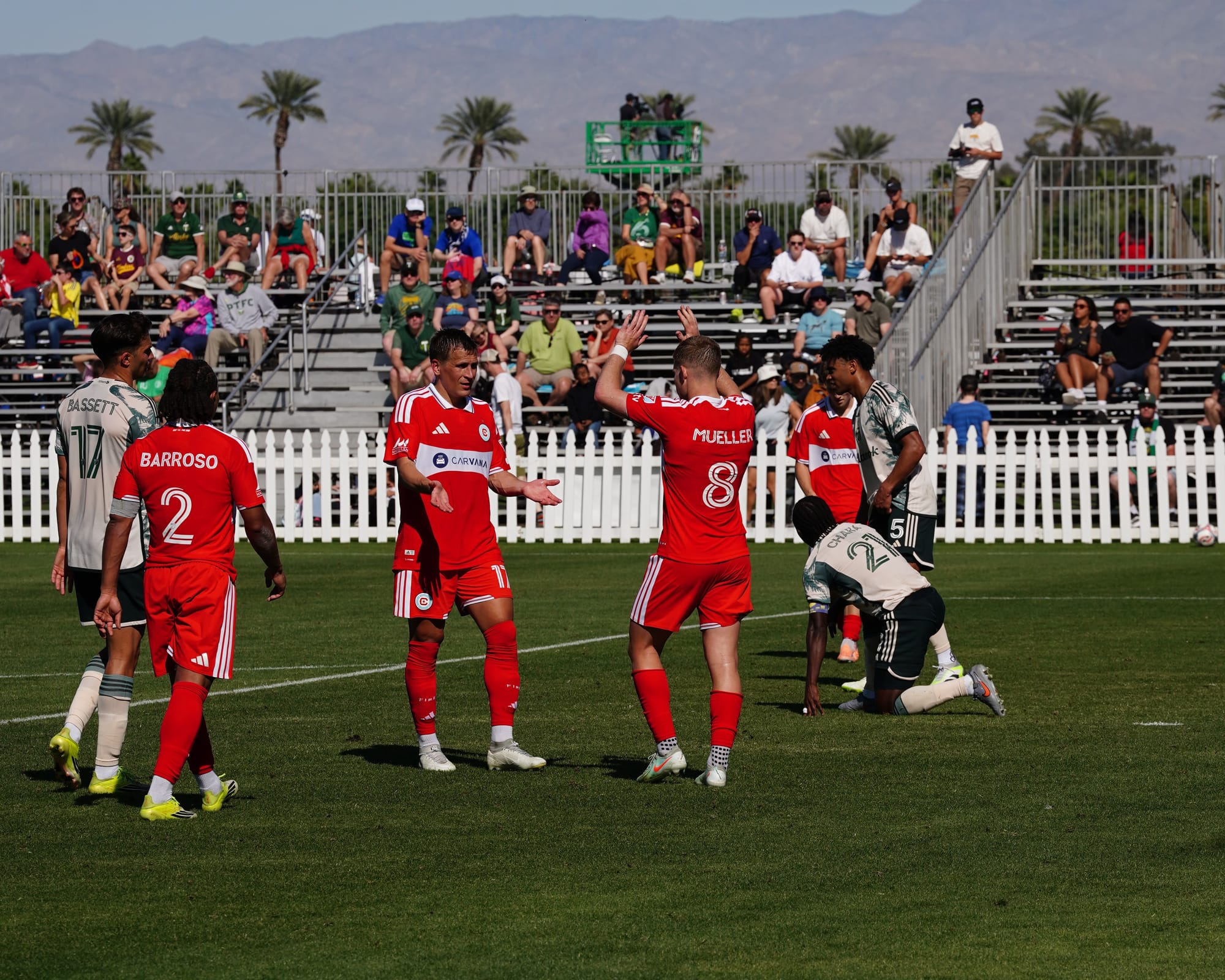 Chicago Fire players celebrate a goal against the Portland Timbers
