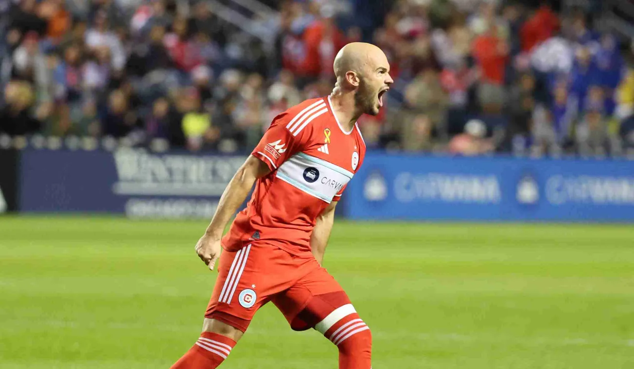Sep 7, 2024; Chicago, Illinois, USA; Chicago Fire FC defender Andrew Gutman (15) celebrates after scoring a goal during the s