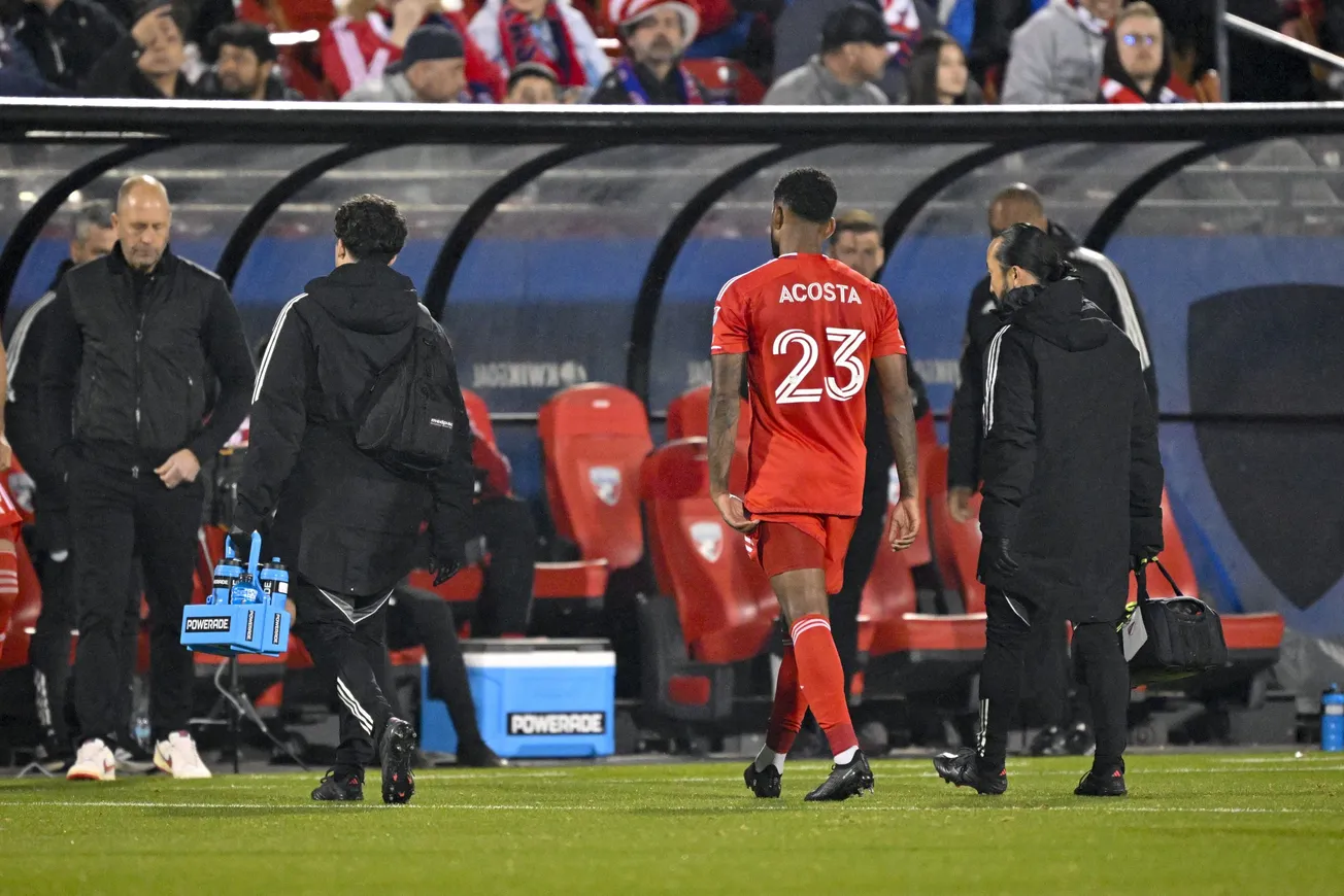 Mar 8, 2025; Frisco, Texas, USA; Chicago Fire midfielder Kellyn Acosta (23) leaves the game with an apparent injury during th