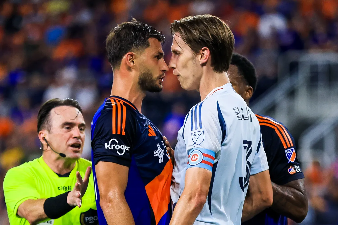 Jul 5, 2025; Cincinnati, Ohio, USA; FC Cincinnati defender Matt Miazga (21) argues with Chicago Fire FC defender Jack Elliott
